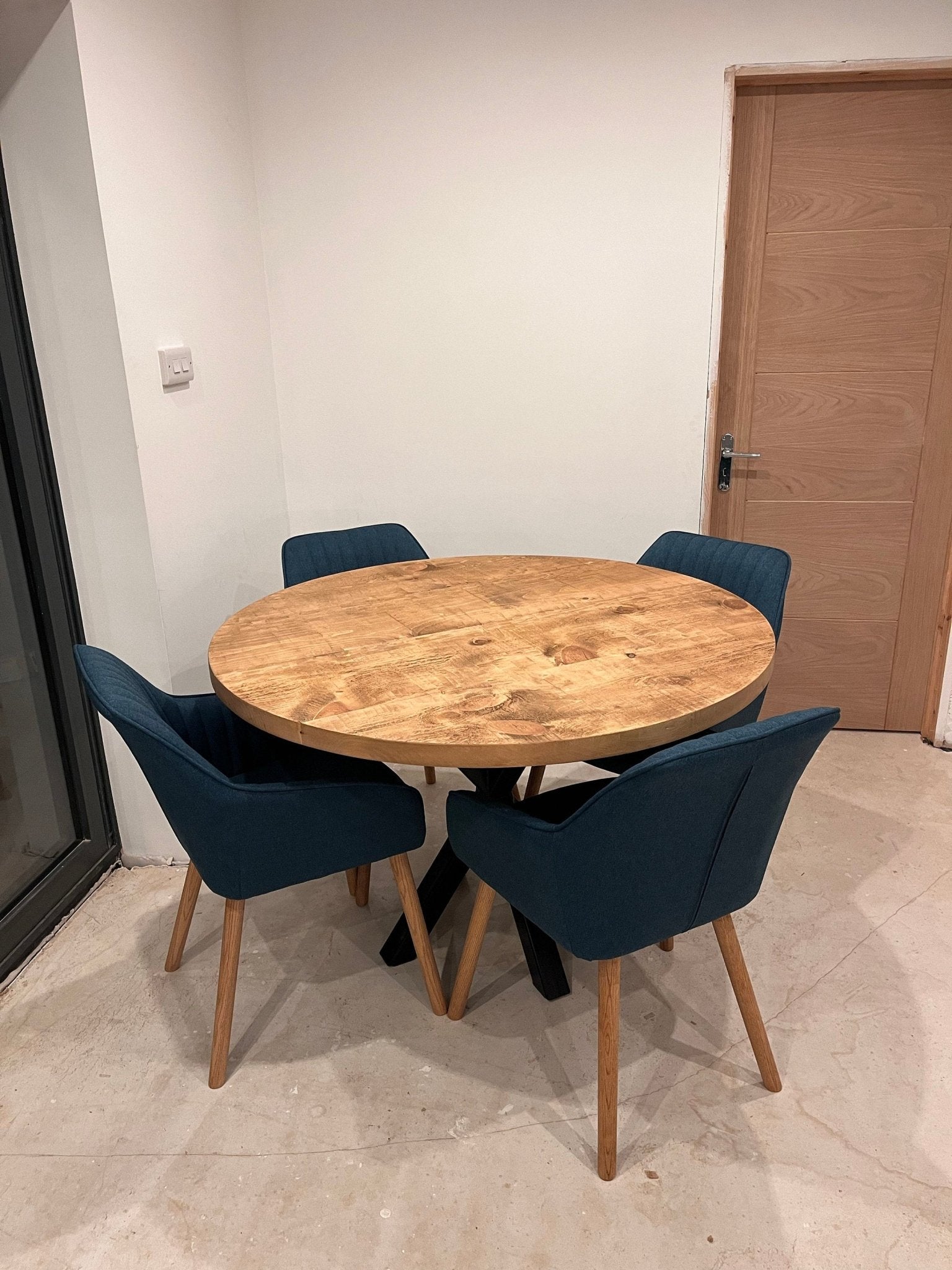 Extending round rustic central leg dining table - The Grain Company Ltd