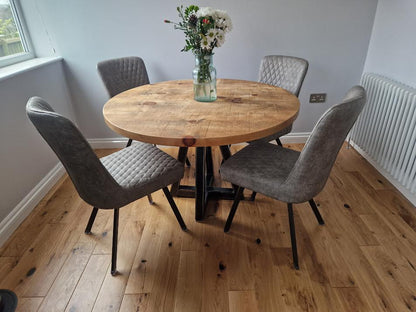 Round rustic dining table with central steel leg - The Grain Company Ltd